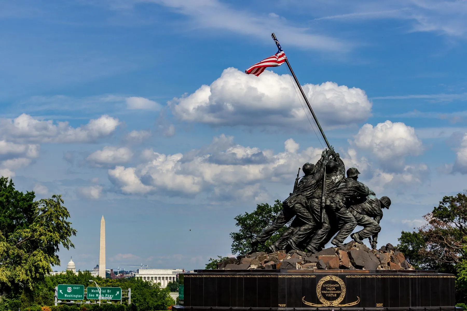 The Marine Corps War Memorial in Arlington with the Washington Monument beyond it. The Marine Corps Marathon finishes at the memorial, on the Virginia side of the Potomac.
