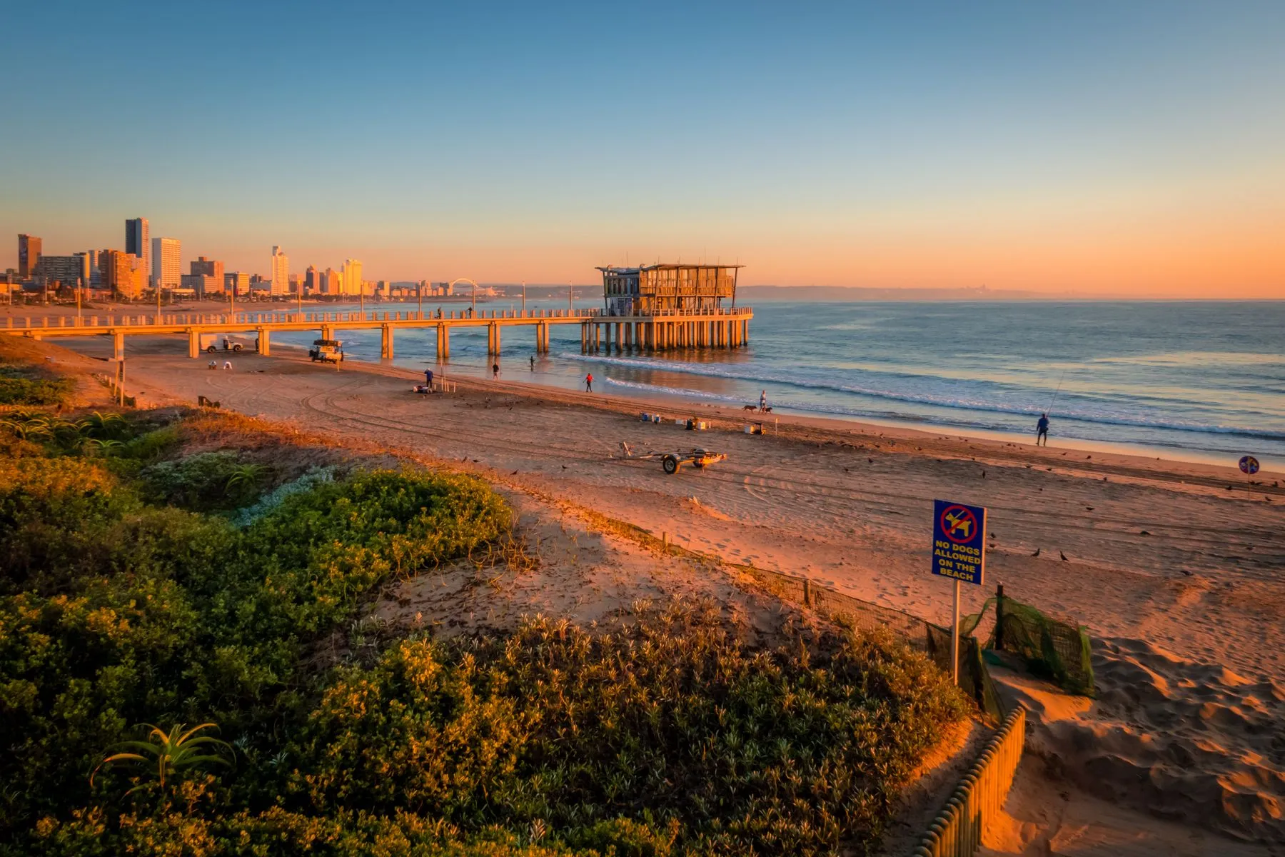 Sunrise over Durban's beachfront — the 2027 Comrades is a Down Run, finishing here after starting in Pietermaritzburg.