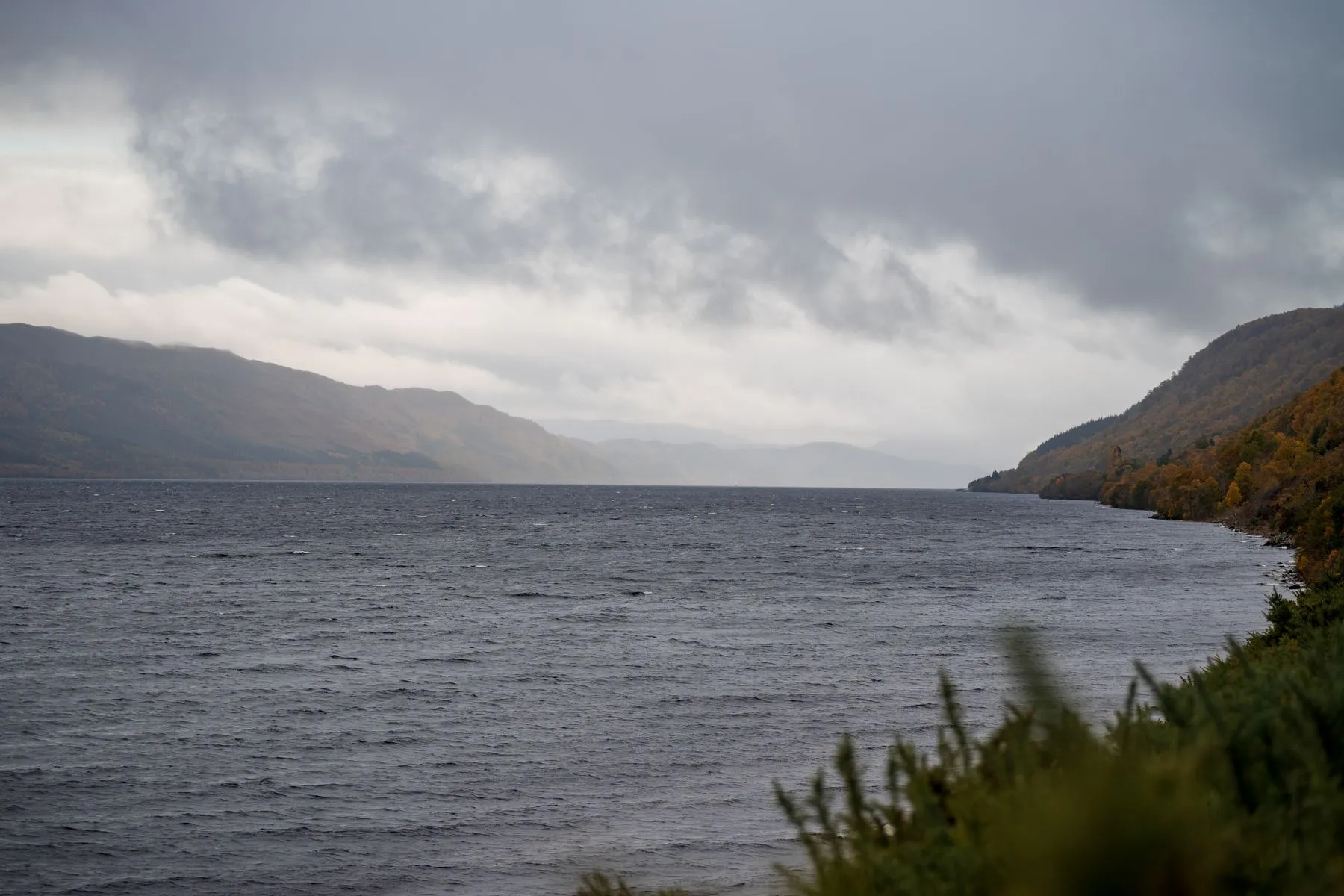 Loch Ness under autumn cloud, the marathon runs the length of the south-eastern shore from a moorland start to Inverness.